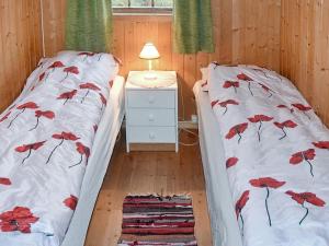 Postel nebo postele na pokoji v ubytování Holiday home Leirvik I Sogn