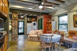 a kitchen and living room with a table and chairs at Little House Nashville - Guest House in Nashville