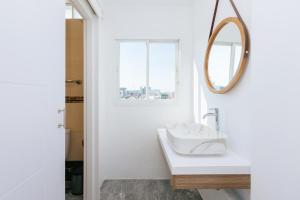 Koupelna v ubytování Baan Sutra Guesthouse + 37 fotografií