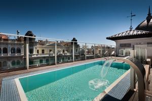 The swimming pool at or close to Catalonia Gran Vía Madrid