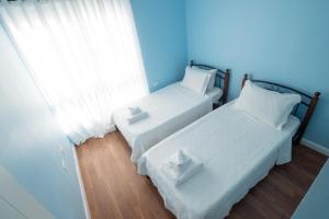 Kama o mga kama sa kuwarto sa Modern 3 Bedroom Condo In Private Community #5
