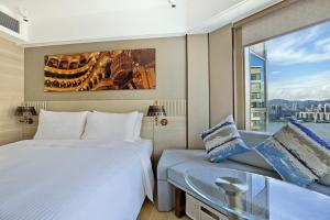 Giường trong phòng chung tại Hotel Alexandra