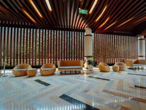 Posezení v ubytování Rayz UMM Hotel Malang