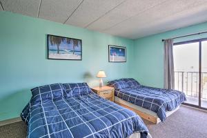 Ένα ή περισσότερα κρεβάτια σε δωμάτιο στο Simple North Wildwood Condo - Steps to Beach!