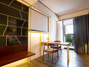Posezení v ubytování Rayz UMM Hotel Malang
