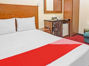 Postel nebo postele na pokoji v ubytování Al Arraf Hotel