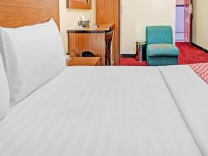 Postel nebo postele na pokoji v ubytování Al Arraf Hotel