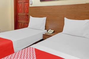 Postel nebo postele na pokoji v ubytování Al Arraf Hotel