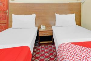 Postel nebo postele na pokoji v ubytování Al Arraf Hotel