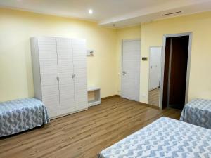 Postel nebo postele na pokoji v ubytování Park Hotel