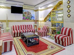 TV a/nebo společenská místnost v ubytování Al Arraf Hotel
