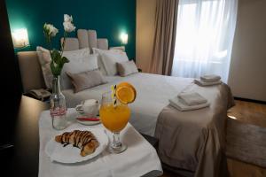 Postel nebo postele na pokoji v ubytování Boutique Hotel Bura 45N
