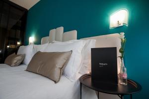 Postel nebo postele na pokoji v ubytování Boutique Hotel Bura 45N