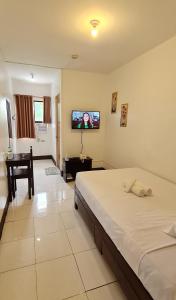 TV a/nebo společenská místnost v ubytování AMARANTA SUITES + 19 fotografií
