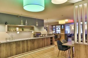 Kuchyň nebo kuchyňský kout v ubytování City-Hotel-Wolgast