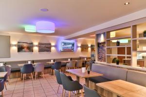 TV a/nebo společenská místnost v ubytování City-Hotel-Wolgast