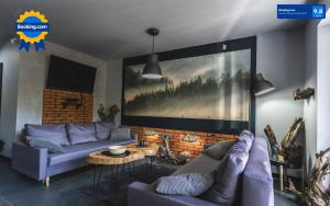 Część wypoczynkowa w obiekcie Apartamenty SPOKOLOKO Skrzyczne Residence Korzenny i Kamienny
