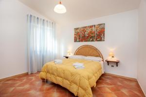 A bed or beds in a room at Casa Barvis