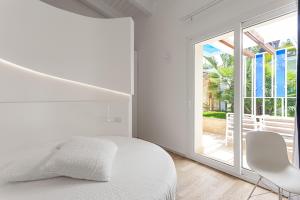 Postel nebo postele na pokoji v ubytování Calapetra Resort