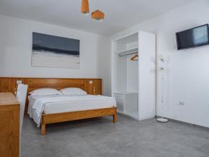 Postel nebo postele na pokoji v ubytování A est b&b Otranto
