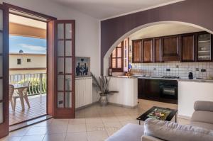 Cuisine ou kitchenette dans l'établissement House&Villas - Villa Patrizia - Vittorio Apartment