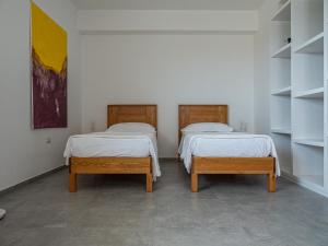 Postel nebo postele na pokoji v ubytování A est b&b Otranto