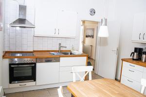 Kuchyň nebo kuchyňský kout v ubytování Ferienhaus Rike + 18 fotografií