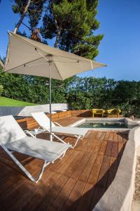 Bazén v ubytování Calapetra Resort nebo v jeho okolí