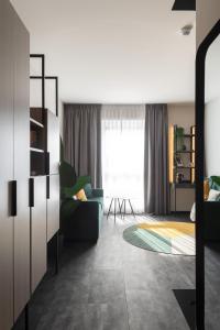 Postelja oz. postelje v sobi nastanitve Ariane Hotel