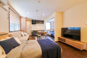 Μια τηλεόραση ή/και κέντρο ψυχαγωγίας στο 王子神谷ハウス OJIKAMIYA HOUSE