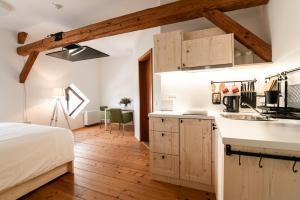 A kitchen or kitchenette at Apartments Strmol
