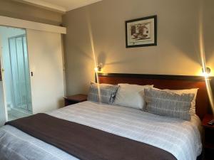 Katil atau katil-katil dalam bilik di Bluewaters Hotel