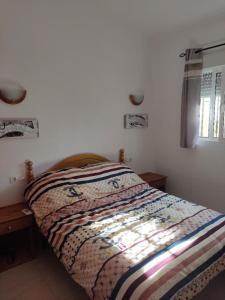Ein Bett oder Betten in einem Zimmer der Unterkunft Casa Joleen 2