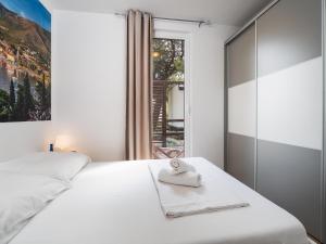 Postel nebo postele na pokoji v ubytování Salve Croatia Mobile Homes in Amadria Park Trogir
