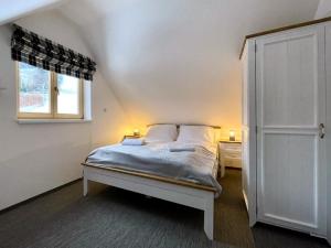 Postel nebo postele na pokoji v ubytování Roubenka pod Lysou - Malenovice + 28 fotografií