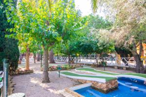 Vonkajšia záhrada v ubytovaní Camping & Resort La Torre del Sol