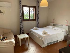 Rúm í herbergi á Alice Kite Resort