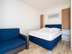 Salve Croatia Mobile Homes in Amadria Park Trogir客房内的一张或多张床位