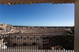 a view of the city from a balcony at Hora Mare in Orosei +8 photos