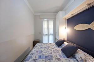 Posteľ alebo postele v izbe v ubytovaní Victoria Apartments Acquarius