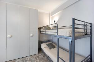 A bed or beds in a room at Victoria Apartments Maiolica