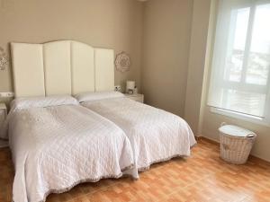 Postel nebo postele na pokoji v ubytování Apartment Lucena Center Atico Parking Gratis