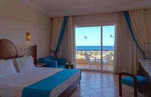 Utopia Beach Club客房内的一张或多张床位