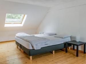 Un pat sau paturi într-o cameră la Holiday Home near Ravel Cycling paths