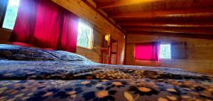 Postel nebo postele na pokoji v ubytování Casita Arco Iris