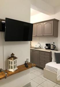 A kitchen or kitchenette at Aitherial Summer House