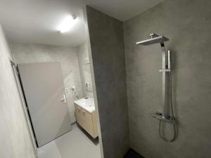 Koupelna v ubytování Hôtel MAAS
