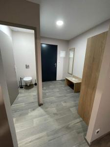 Postel nebo postele na pokoji v ubytování Hôtel MAAS