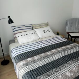 Posteľ alebo postele v izbe v ubytovaní Apartament PERŁA POŁUDNIA
