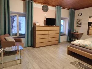 TV a/nebo společenská místnost v ubytování B&B Leonhard 7